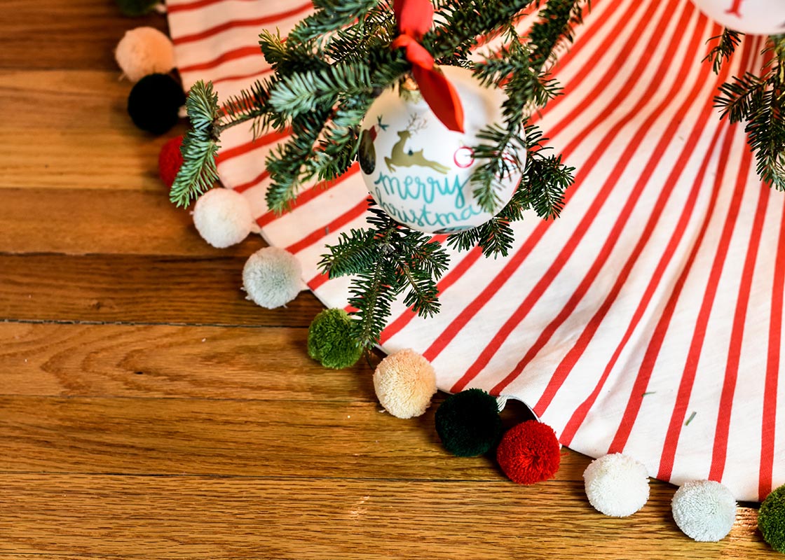 Red Stripe Tree Skirt With Pom Poms